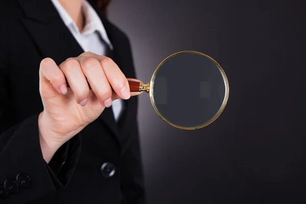 Businesswoman Holding Magnifying Glass — Stock Photo, Image