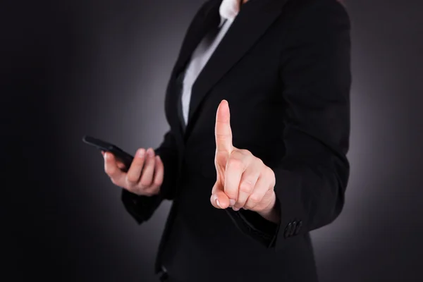 Mujer de negocios señalando — Foto de Stock