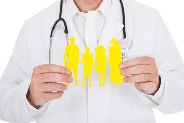 Manliga läkare håller papper familj — Stockfoto