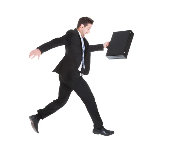 Businessman With Suitcase Stock Photo