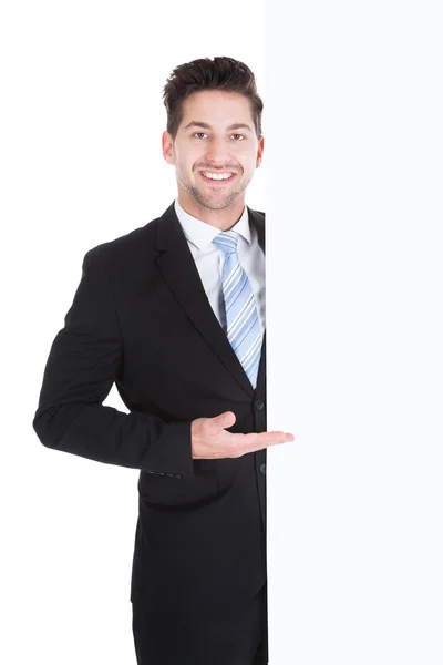 Businessman Showing Billboard Stock Image