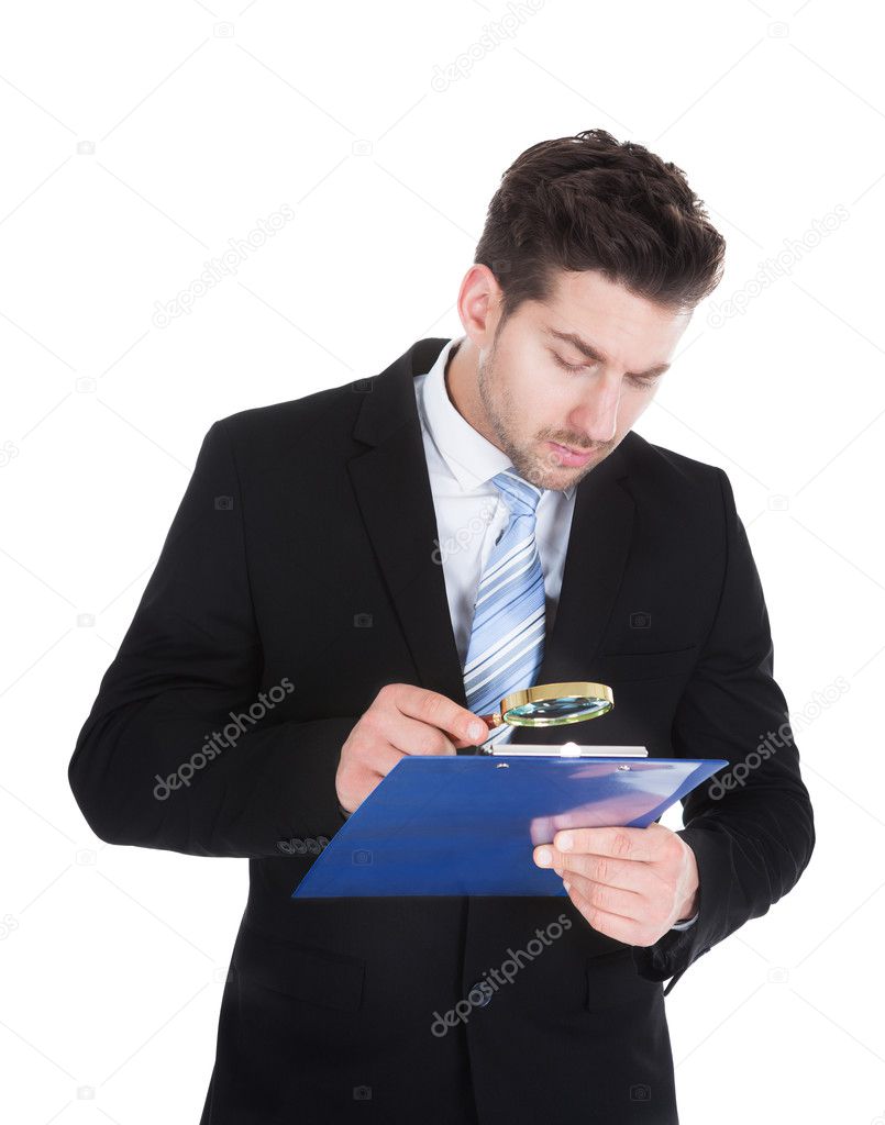 Businessman Examining Document