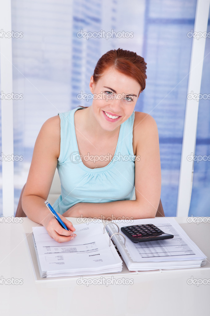 Woman Calculating  Finances