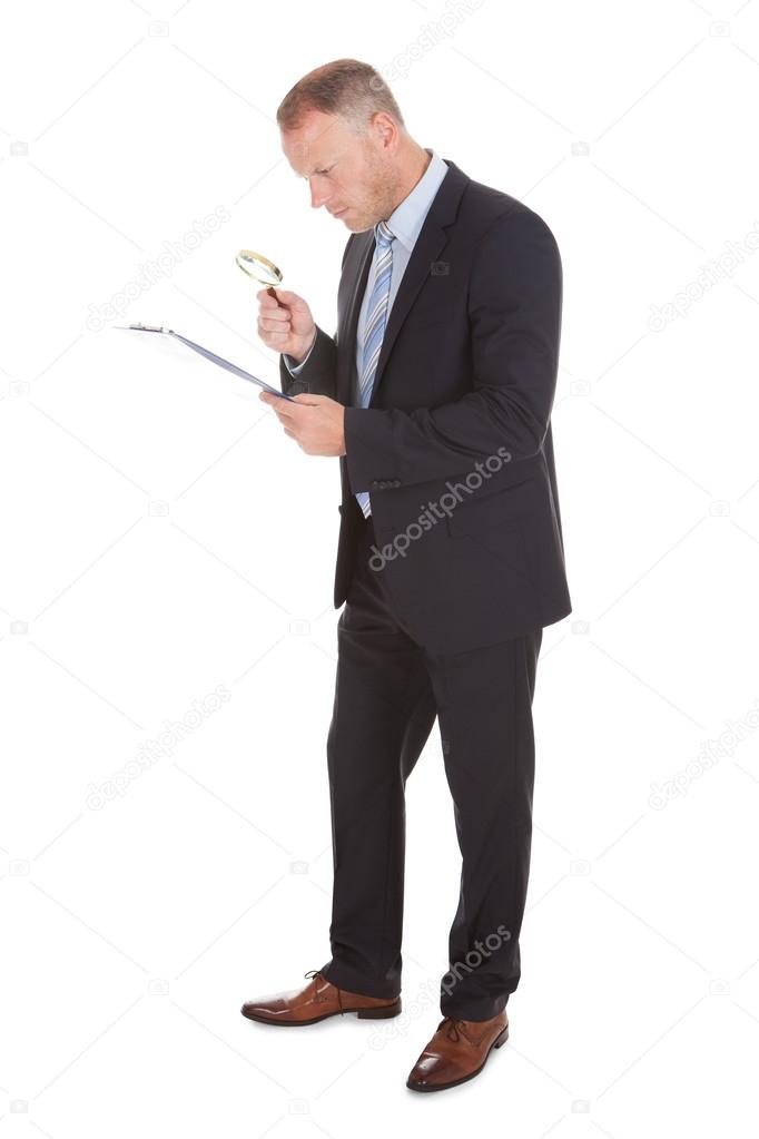 Businessman Examining Document