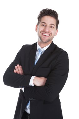 iş adamı ayakta kollarını çapraz