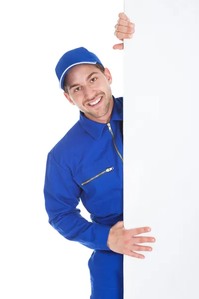 Smiling Manual Worker With Billboard — Stock Photo, Image