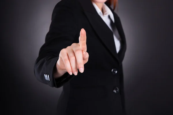 Businesswoman Touching Imaginary Screen — Stock Photo, Image