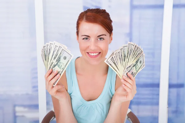 Woman Showing Dollar Bills — Stock Photo, Image