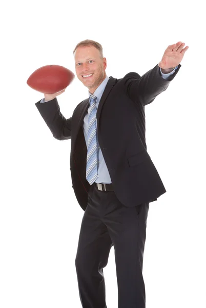 Empresário Jogando Rugby Ball — Fotografia de Stock