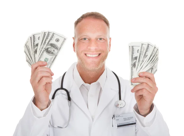 Male Doctor Holding Banknotes — Stock Photo, Image