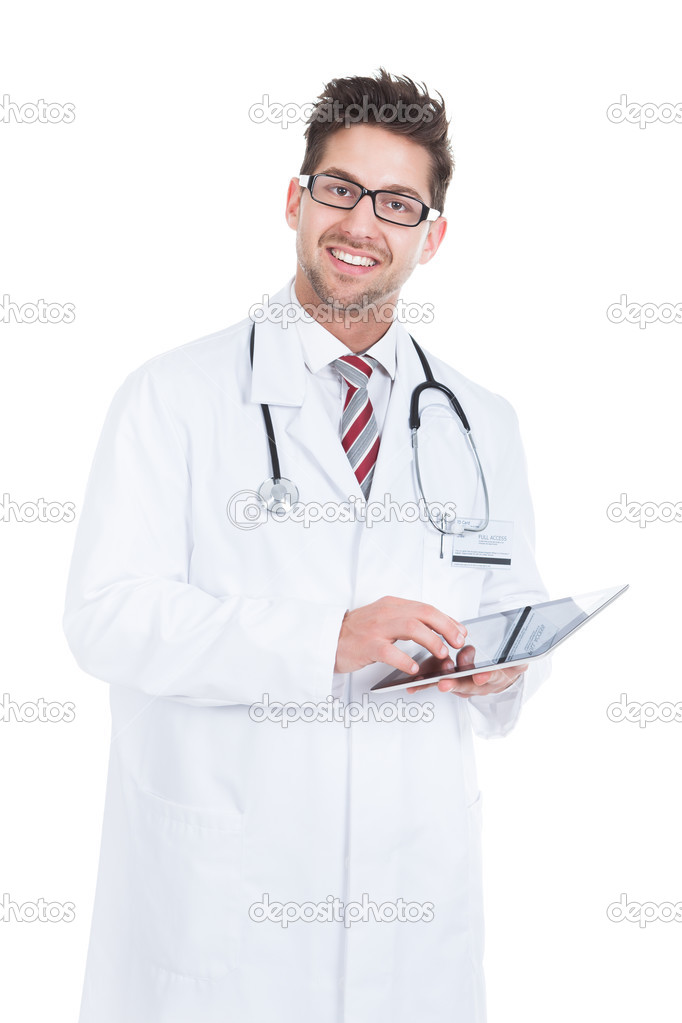 Smiling Male Doctor Using Digital Tablet