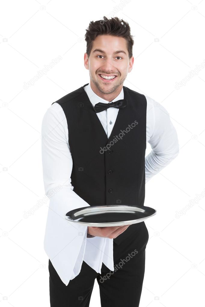Young Waiter Holding Empty Serving Tray
