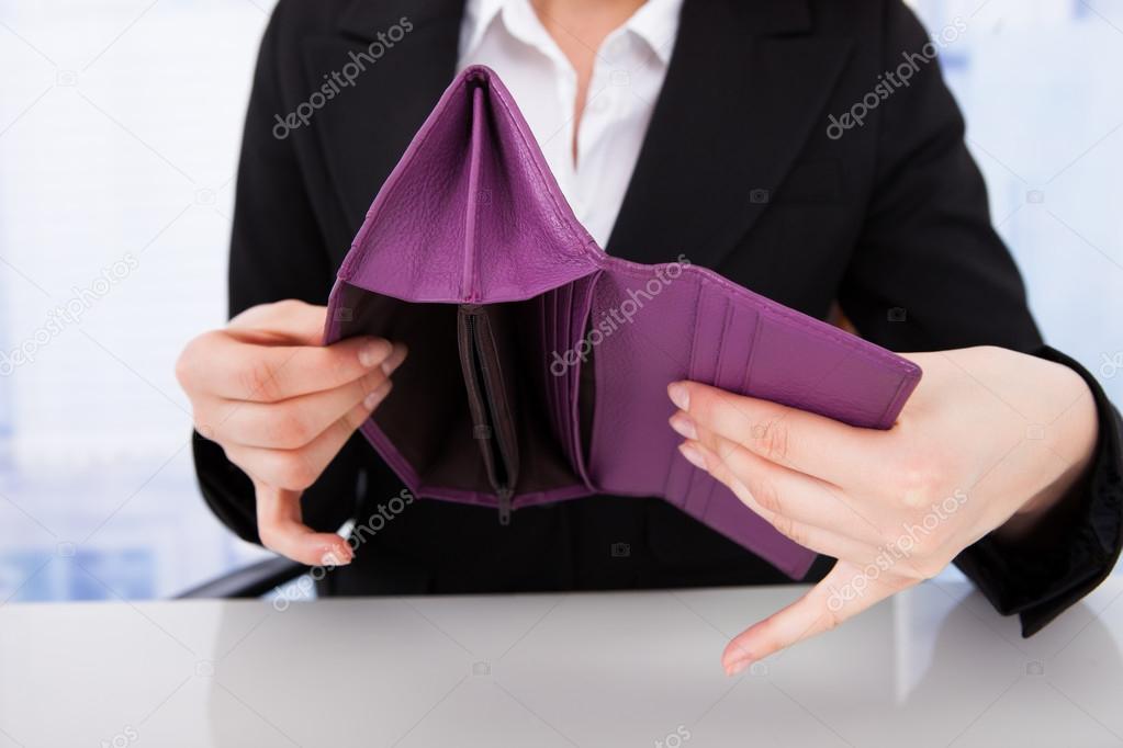 Businesswoman Holding Empty Wallet