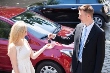 Salesman Handing Key clipart