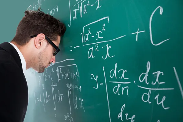 Professor Leaning Head On Blackboard — Stock Photo, Image