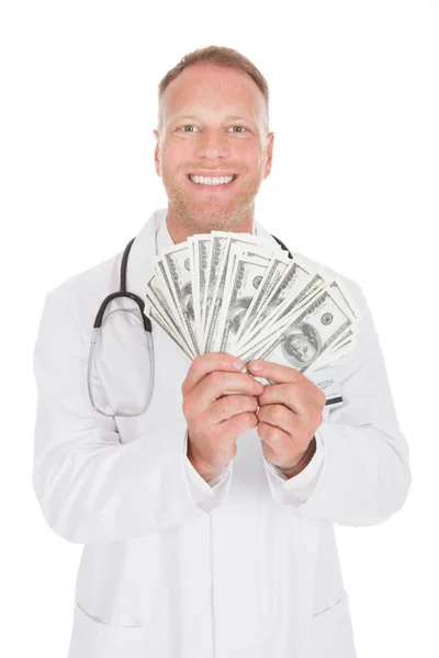 Doctor Holding Banknotes — Stock Photo, Image