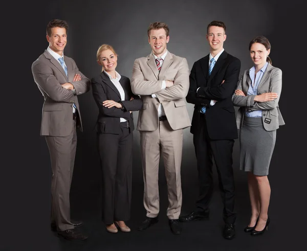 Equipe de negócios Braços de pé cruzados — Fotografia de Stock