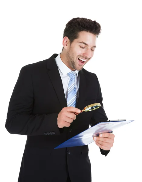 Businessman Examining Document — Stock Photo, Image