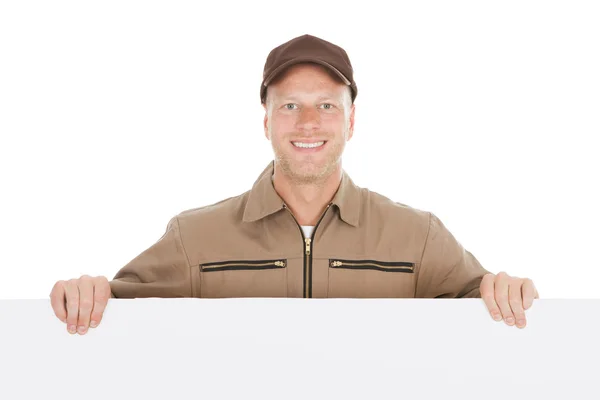 Smiling Manual Worker With Billboard — Stock Photo, Image