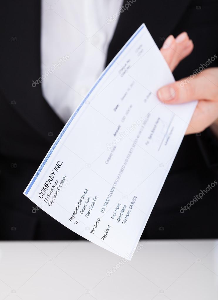 Businesswoman Holding Cheque