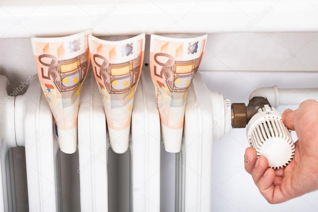 Euro banknotes stuck in radiator