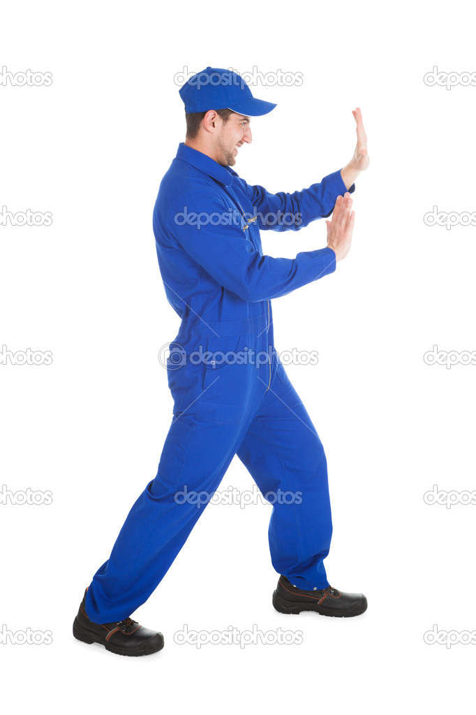 Male Worker Pushing Empty Space