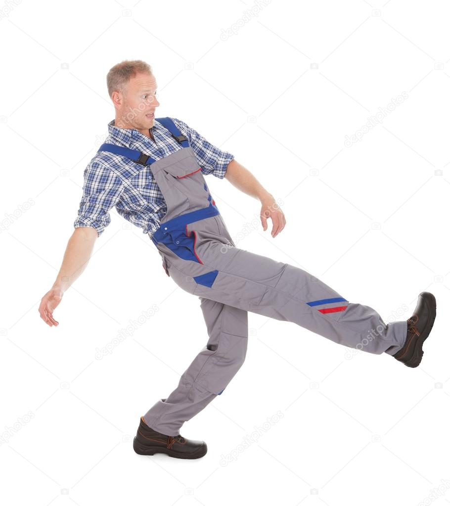 Male worker slipping