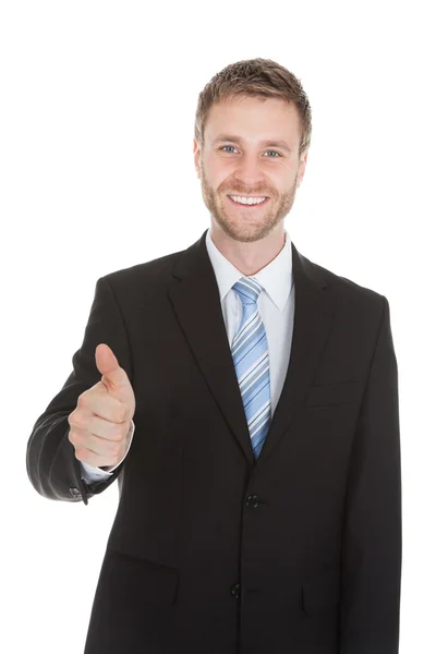 Üzletember mutatja hüvelykujját felfelé — Stock Fotó