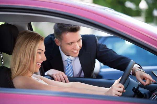 Salesman Showing Car — Stock Photo, Image