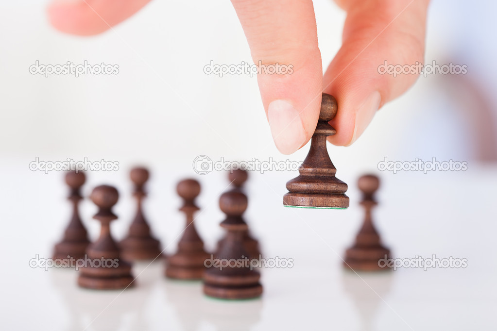 Hand Holding Chess