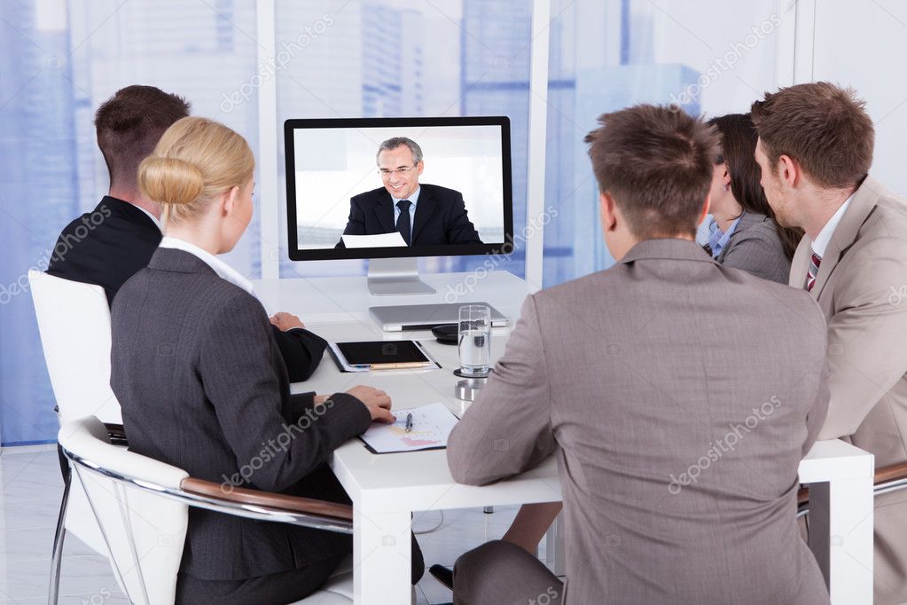 Business People In Video Conference — Stock Photo © AndreyPopov #49939727