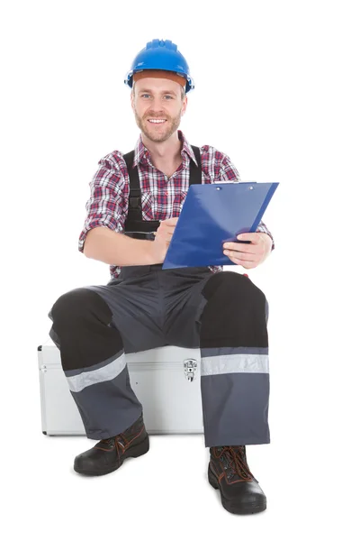 Worker Writing On Clipboard — Stock Photo, Image