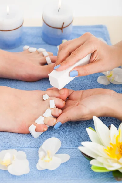 Pedicurist Filing Toenails — Stock Photo, Image