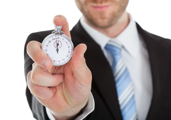 Businessman Showing Stopwatch — Stock Photo, Image