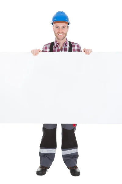 Işçi holding billboard — Stok fotoğraf