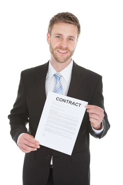 Zakenman houden contract papier — Stockfoto