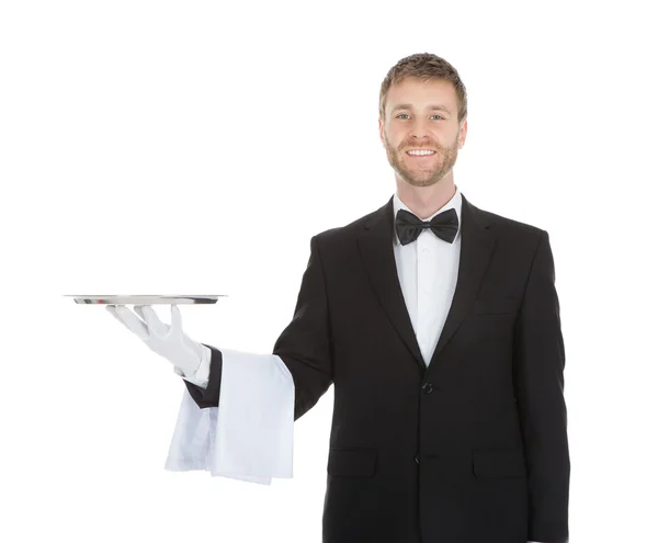 Официант держит поднос — стоковое фото