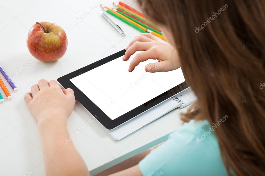 Schoolgirl Using  Tablet