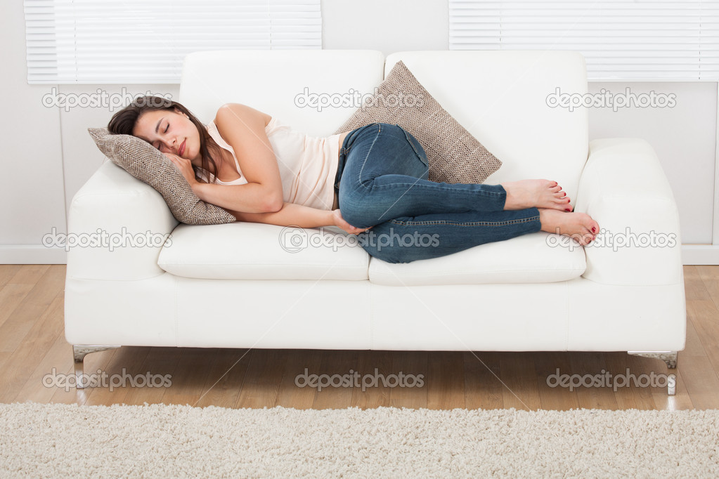 Woman Sleeping On Sofa