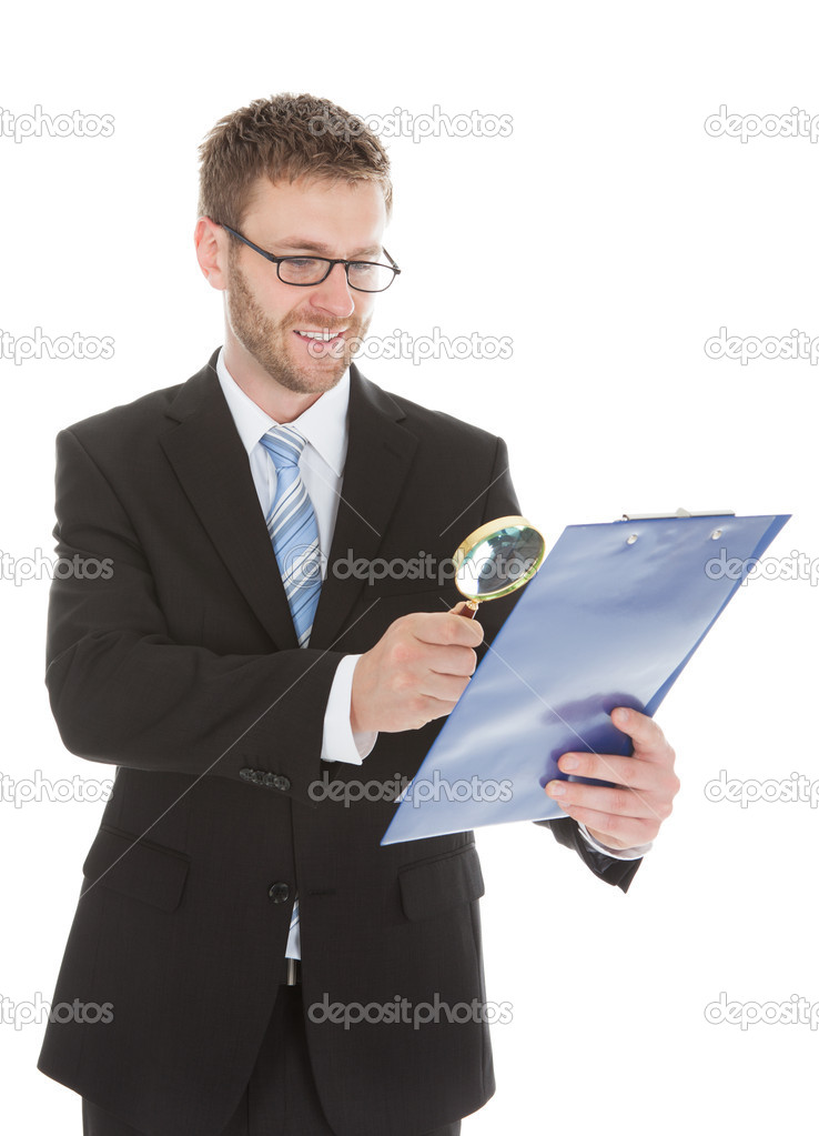 Businessman Examining Document