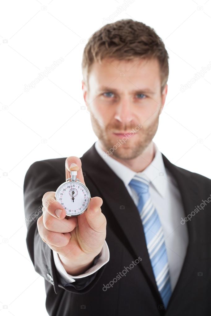 Businessman Showing Stopwatch