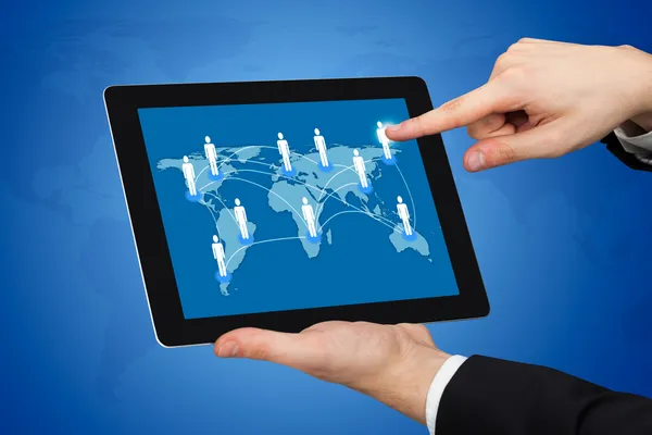 Businessman Touching World Map On Digital Tablet — Stock Photo, Image