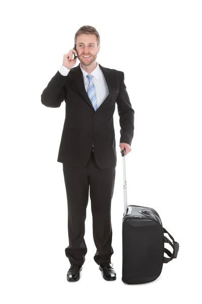 Homme d'affaires avec bagages — Photo