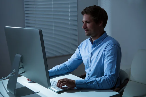 Businessman Working Late In Office — Stock Photo, Image