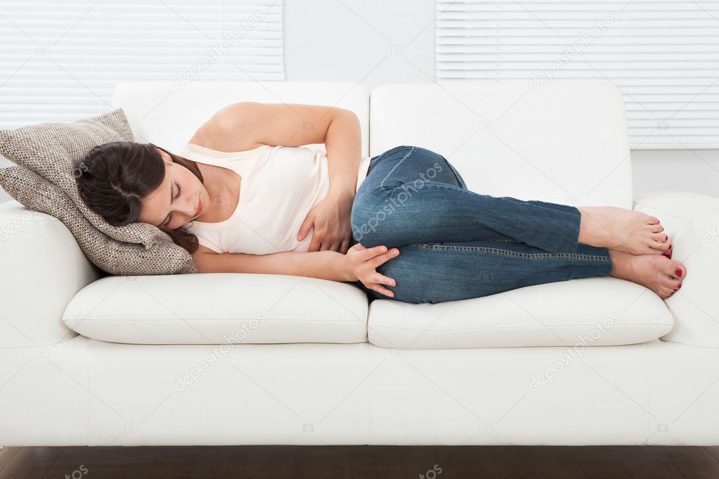 Woman suffering from stomachache