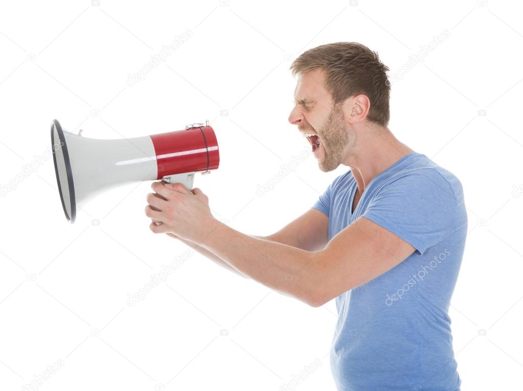 Man screaming into megaphone