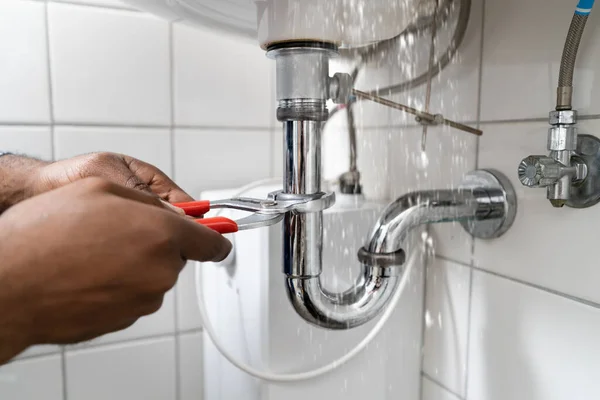 Plumber Water Pipe Leak Repair Bathroom Leakage — Stock Photo, Image