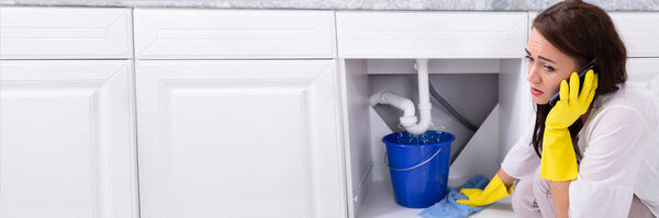 Plumbing Leak Problem Emergency Call In Kitchen