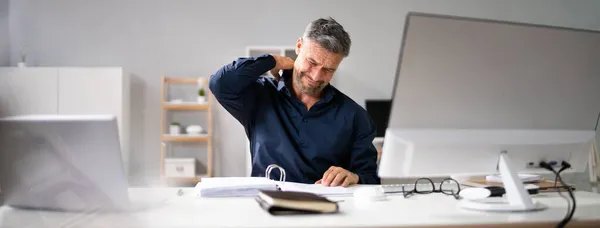 Neck Pain And Stress. Bad Posture At Computer In Office