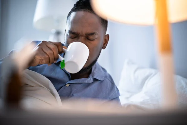 Sick African American Man Drinking Bed — Stock Photo, Image